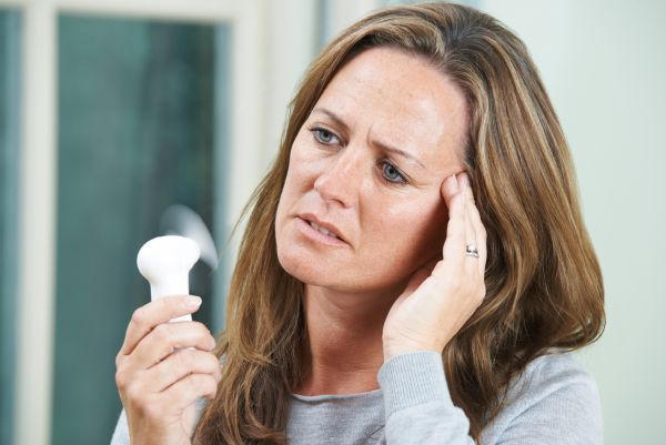 Menopause symptoms often include hot flashes